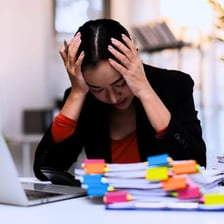 A worried person considering a possible mishap.