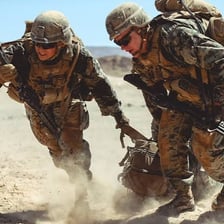 U.S. Marines in uniform during a training exercise.