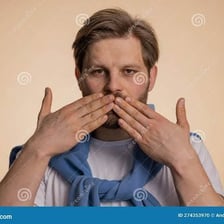 A person making a revealing nervous gesture while speaking.