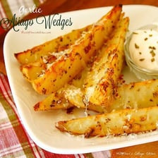 Wedges of Asiago and Gorgonzola cheese.