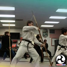 Karate students practicing in a dojo