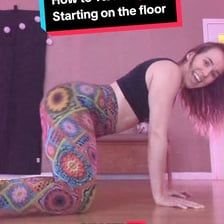 A dancer performing a twerking move