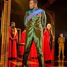 A stage production depicting Iago from Shakespeare’s Othello.