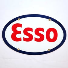 A red and blue Esso service-station sign.