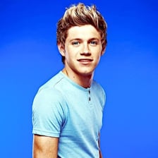Niall Horan performing with One Direction