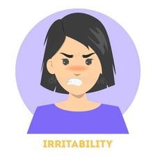 A person showing mild frustration after an unwelcome surprise.
