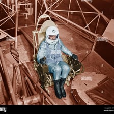 An astronaut subjected to acceleration in a centrifuge.