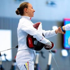 An athlete uses an épée during the fencing event of the modern pentathlon.