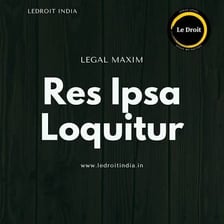 An open law book displaying a Latin legal maxim.
