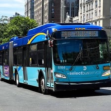 A New York City Metropolitan Transportation Authority bus bearing the MTA logo.