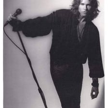 Val Kilmer portraying Jim Morrison in The Doors.