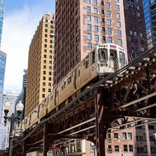 A Chicago elevated train traveling on an elevated track.