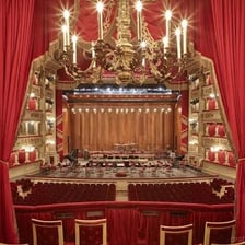 An opera performance on a theater stage.