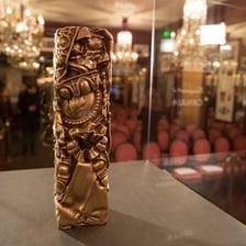 A César Award statuette presented for achievement in French cinema