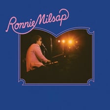 Country singer Ronnie Milsap performing onstage.