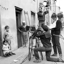 A small independent film crew working on a production set.