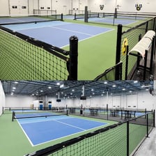 A net stretched across the center of a pickleball court.