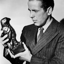 Humphrey Bogart portraying Sam Spade in The Maltese Falcon.