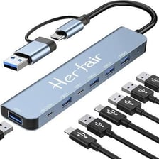 A small USB dongle plugged into a laptop computer