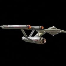 The Starship Enterprise depicted in flight.