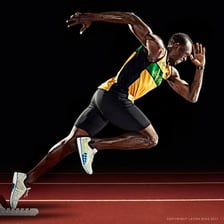 Usain Bolt running in a sprint race