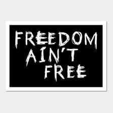 A poster displaying the phrase “Freedom isn’t free.”