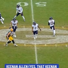 A football defender intercepting a pass