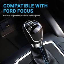 A Ford Focus shown with its gear shift in the foreground.