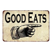 A diner-style sign displaying the phrase “Good Eats”