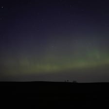 A weak, barely visible light in the distance