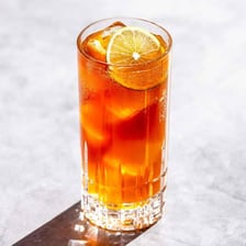 A Dark ’n’ Stormy cocktail made with rum and ginger beer.