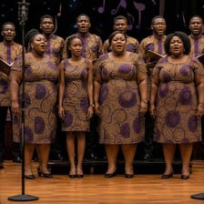 Choir singers performing an alto vocal part.