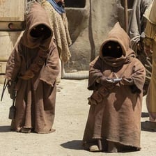 Hooded Jawa scavengers from Star Wars.