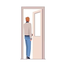 A person walking out through a doorway