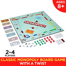 A six-sided die next to a Monopoly board.