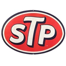 A vintage race car bearing the STP logo