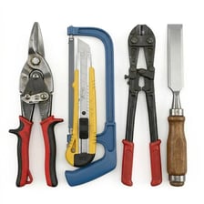 An assortment of hand tools arranged in a workshop