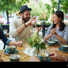A person entertaining friends with a story.