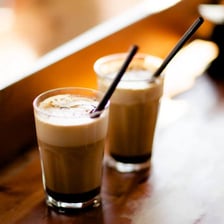 A mocha served inside a coffee café.