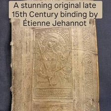 A historian examining old documents in an archive.