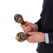 A colorful maraca, a hand-held percussion shaker