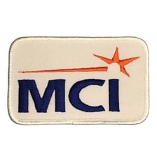 A vintage MCI telecommunications logo.