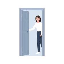A person being directed toward an exit door