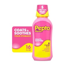A bottle of Pepto-Bismol showing its characteristic pink liquid
