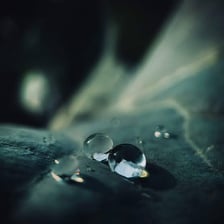 A close-up image emphasizing a very small drop or amount.