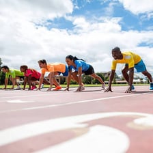 An athlete poised and ready to begin a race