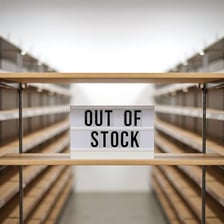 An empty retail shelf indicating that an item is out of stock.