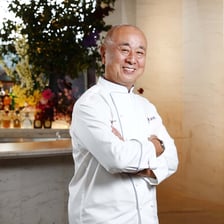 Chef Nobu Matsuhisa in a restaurant kitchen