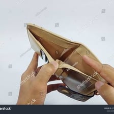 An open wallet with no money inside.