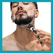 A person using a razor to shave.